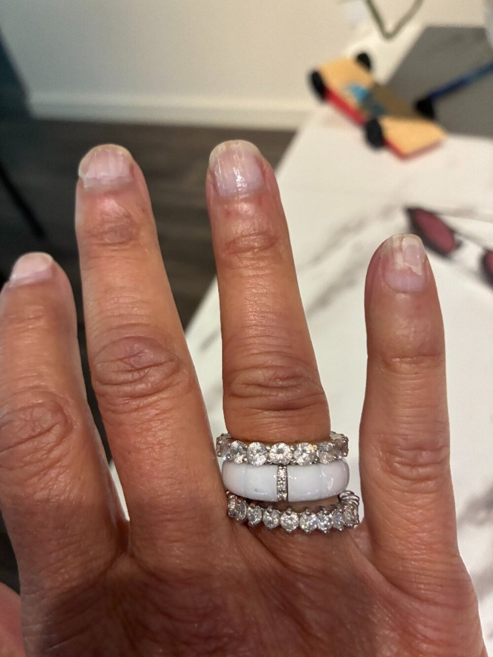 Say I DO in unique 3 stack white and diamond eternity bands